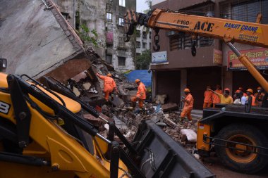 NAVI MUMBAI, INDIA - JULY 27, 2024: A tragic incident occurred early Saturday morning in CBD Belapur area when a three-storey residential building collapsed, resulting in the death of three individuals and injuries to two others clipart