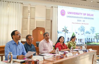 NEW DELHI, INDIA - MAY 28: Vikas Gupta, Registrar of Delhi University along with other DU officials addresses a press conference for the Admission process for the academic year 2024 -2025 along with the launch of Admission Brochure at VC Office clipart