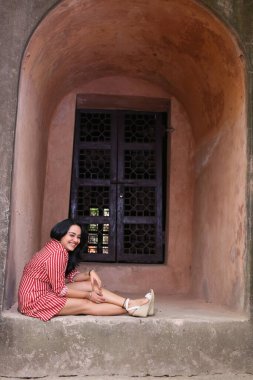 NEW DELHI, INDIA - APRIL 13, 2024: Bollywood actress Apoorva Arora poses during an exclusive interview and special shoot with HT City on World Heritage Day, on April 13, 2024 in New Delhi, India clipart