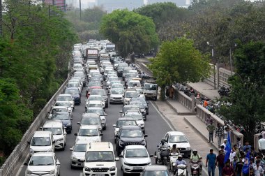 NOIDA, INDIA - APRIL 14: Traffic jam due to celebration of Ambedkar Jayanti at Rashtriya Dalit Prerna Sthal, sector 95, on April 14, 2024 in Noida, India.  clipart