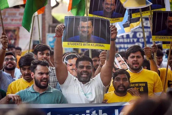 stock image NEW DELHI, INDIA - APRIL 16, 2024: Students from CYSS, student wing of Aam Admi Party seen during a protest march against the arrest of Delhi CM Arvind Kejriwal at Arts Faculty, North Campus on April 16, 2024 in New Delhi, India.