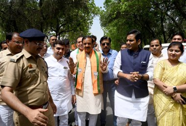 GREATER NOIDA, INDIA - APRIL 3: BJP Candidate from Gautam Budh Nagar parliamentary constituency Mahesh Sharma (Centre) filed his nomination at Surajpur Collector Office, on April 3, 2024 in Greater Noida, India.  clipart