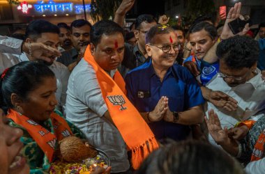 MUMBAI, INDIA - APRIL 30: Former special public prosecutor Ujjwal Nikam contesting the Lok Sabha election from the Mumbai North Central constituency election rally at Sahar Village, Andheri on April 30, 2024 in Mumbai, India.  clipart