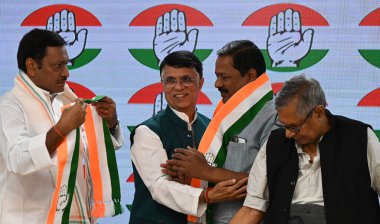 NEW DELHI, INDIA - APRIL 2, 2024: Lok Sabha BJP MP from Muzaffarpur Ajay Nishad joins Congress Party in presence of Incharge, Bihar Mohan Prakash,  Chairman, Media & Publicity (Comms Dept) Pawan Khera, MP & Bihar PCC president Akhilesh Prasad Singh. clipart