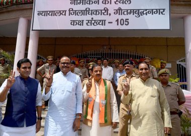 GREATER NOIDA, INDIA - APRIL 3: BJP Candidate from Gautam Budh Nagar parliamentary constituency Mahesh Sharma (Centre) filed his nomination at Surajpur Collector Office, on April 3, 2024 in Greater Noida, India.  clipart