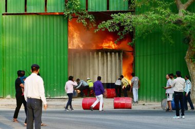 NEW DELHI, INDIA - APRIL 21: A massive fire broke out in the ground area of an under-construction complex of the new Central Secretariat, on April 21, 2024 in New Delhi, India. clipart