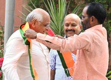 NEW DELHI, INDIA - APRIL 1: Chief Minister of Gujarat Bhupendra Rajnikant Patel arrives to attend BJP manifesto committee meeting ahead of the upcoming Lok Sabha elections, at BJP HQ, on April 1, 2024 in New Delhi, India clipart