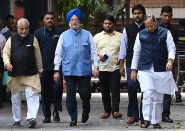 NEW DELHI, INDIA - APRIL 1, 2024: BJP delegation comprising Union Minister Hardeep Singh Puri and senior BJP leaders Arun Singh and Om Pathak leave after meeting the Election Commission of India, at Nirvachan Sadan. clipart