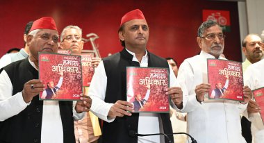 LUCKNOW, INDIA - APRIL 10, 2024: Samajwadi Party President Akhilesh Yadav and other SP leaders released the party Manifesto for the upcoming Lok Sabha election at Samajwadi Party office, on April 10, 2024 in Lucknow, India. clipart