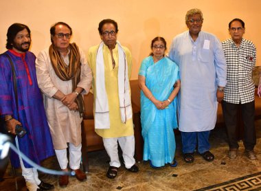 MUMBAI, INDIA - APRIL 16: Pandit Hridaynath Mangeshkar, Usha Mangeshkar and Adinath Mangeshkar to make a very important announcement of this year's winners of Lata Mangeshkar Puraskar and Master Dinanath Mangeshkar Puraskar at Prabhu Kunj Peddar road clipart