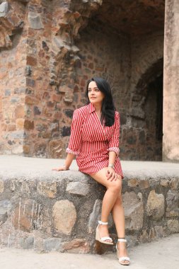 NEW DELHI, INDIA - APRIL 13, 2024: Bollywood actress Apoorva Arora poses during an exclusive interview and special shoot with HT City on World Heritage Day, on April 13, 2024 in New Delhi, India clipart