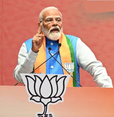 NEW DELHI, INDIA - 14 APRIL 2024: BJP 'den Sankalp Patra' nın Lok Sabha Seçimleri için BJP Genel Merkezi 'nde fırlatılması sırasında Başbakan Narendra Modi
