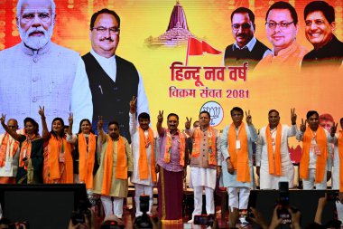 NEW DELHI - APRIL 21, 2024: Uttarakhand CM Pushkar Singh Dhami and Delhi BJP President Virendra Sachdeva with BJP candidates from Delhi for Lok Sabha election Bansuri Swaraj, Kamaljeet Sehrawat, Praveen Khandelwal, Manoj Tiwari, Ramvir Singh Bidhuri clipart