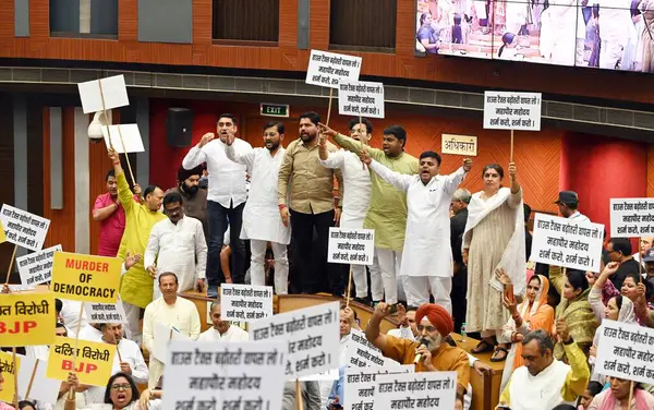 stock image NEW DELHI, INDIA - APRIL 26:  BJP and AAP councilors protest in house of councilors sessions at Civic Centre. The meeting was originally scheduled to hold the elections for the post of mayor and deputy mayor  on April 26, 2024 in New Delhi, India.  