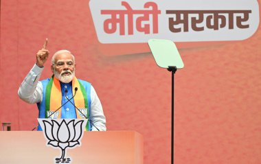 NEW DELHI, INDIA - 14 APRIL 2024: BJP 'den Sankalp Patra' nın Lok Sabha Seçimleri için BJP Genel Merkezi 'nde fırlatılması sırasında Başbakan Narendra Modi