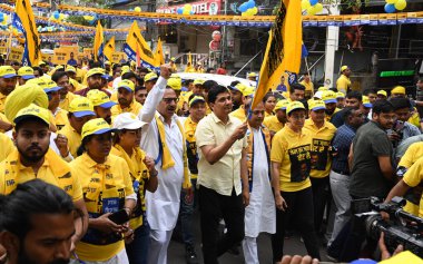 NEW DELHI, INDIA - APRIL 28, 2024: Delhi Cabinet ministers Saurabh Bhardwaj, Atishi and AAP Candidate from New Delhi Somnath Bharti and South Delhi Candidate Sahi Ram Pehalwan for Lok Sabha during a walkathon named 'Walk for Kejriwal'.  clipart