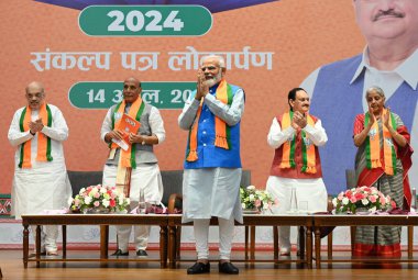 NEW DELHI, INDIA - APRIL 14, 2024: Prime Minister Narendra Modi with Union Defence Minister Rajnath Singh and Home Minister Amit Shah, BJP National president JP Nadda, Minister of Finance Nirmala Sitharaman.  clipart