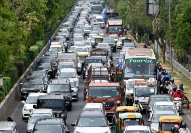 NOIDA, INDIA - APRIL 14: Traffic jam due to celebration of Ambedkar Jayanti at Rashtriya Dalit Prerna Sthal, sector 95, on April 14, 2024 in Noida, India.  clipart