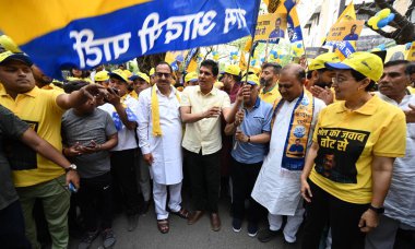 NEW DELHI, INDIA - APRIL 28, 2024: Delhi Cabinet ministers Saurabh Bhardwaj, Atishi and AAP Candidate from New Delhi Somnath Bharti and South Delhi Candidate Sahi Ram Pehalwan for Lok Sabha during a walkathon named 'Walk for Kejriwal'.  clipart