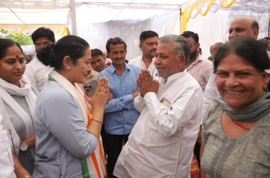 GHAZIABAD, INDIA - APRIL 6: India Alliance Congress Party Lok Sabha candidate Dolly Sharma during election campaigning ahead of Lok Sabha election in Muradnagar, on April 6, 2024 in Ghaziabad, India.  clipart