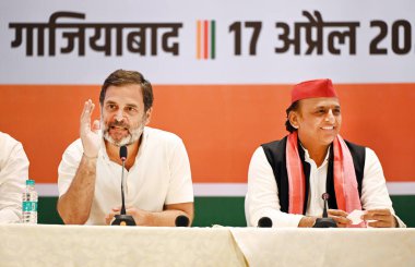 GHAZIABAD, INDIA - APRIL 17: Congress Leader Rahul Gandhi and Samajwadi Party Chief Akhilesh Yadav addressing a joint press conference of INDIA parties at Kaushambi on April 17, 2024 in Ghaziabad, India.  clipart