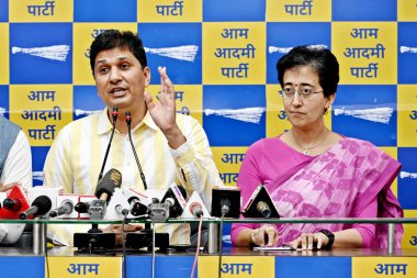 NEW DELHI, INDIA - APRIL 2, 2024: AAP leaders and Delhi Cabinet Minister Saurabh Bharadwaj, Atishi Singh and AAP Leader Jasmine Shah address a press conference after Supreme Court grants bail to AAP leader Sanjay Singh in Delhi excise policy case. clipart