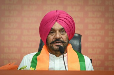 NEW DELHI, INDIA - APRIL 20: Ex Congress leader Tajinder Singh Bittu joins BJP in presence of BJP Leader Vinod Tawde and Union Minister Ashwini Vaishnaw at BJP Headquarters, DDU Marg on April 20, 2024 in New Delhi, India.  clipart