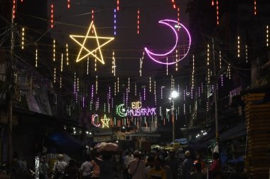 KOLKATA, INDIA - APRIL 10: Streets are decorated with special lighting on the occasion of Eid-al-Fitr in front of Nakhoda Mosque on April 10, 2024 in Kolkata, India.  clipart