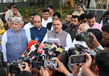 BJP delegation comprising Tarun Chugh, Dr Sudhanshu Trivedi & Om Pathak leave after meeting ECI at Nirvachan Sadan, on April 15, 2024 in New Delhi, India. clipart