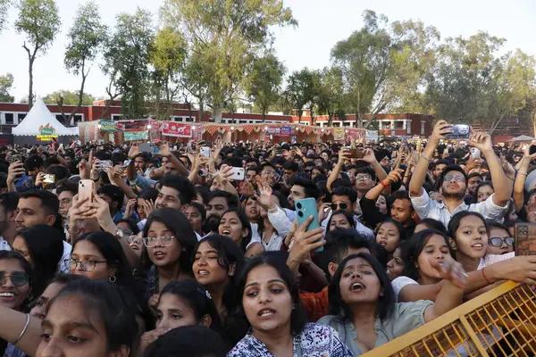 stock image NEW DELHI, INDIA - APRIL 8, 2024: Crowd enjoying the performance of Singer Akhil Sachdeva aka Nashaboy during an annual fest - Confluence 24 at Hansraj College, Delhi University, on April 8, 2024 in New Delhi, India. 