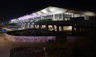 LUCKNOW , INDIA - MARCH 9: The third terminal of Lucknow Airport all lit up on Saturday, to be inaugurated on Sunday, Defence Minister Rajnath Singh is to be present in person at Chaudhary Charan Singh International Airport, on March 9, 2024  clipart