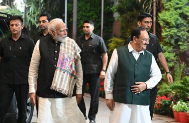 NEW DELHI, INDIA - MARCH 11, 2024: Prime Minister Narendra Modi with BJP National President J P Nadda during BJP Central Election committee meeting at BJP HQ on March 11, 2024 in New Delhi, India. (Photo by Sanjeev Verma/Hindustan Times) clipart