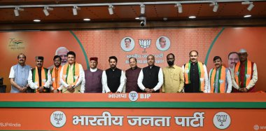 NEW DELHI, INDIA - MARCH 23, 2024: Former Himachal Pradesh Congress party MLA's Sudhir Sharma, Rajender Rana, Ravi Thakur, Indradutt Lakhanpal, Devendra Bhutto, Chaitanya Sharma join BJP in the presence of Union Minister Anurag Thakur clipart