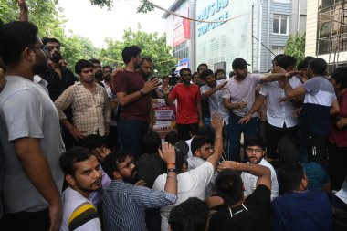 NEW DELHI, INDIA - JULY 29: RAU Students site dharna the IAS coaching institute in Old Rajinder Nagar, where 3 students died due to drowning,  on July 29, 2024 in New Delhi, India.  (Photo by Sonu Mehta/Hindustan Times)  clipart