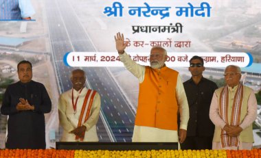 GURUGRAM, INDIA - MARCH 11:  Prime Minister Narendra Modi, Cabinet Minister Nitin Gadkari, Governor Bandaru Dattatreya, Chief Minister Manohar Lal during inaugurates the Dwarka Expressway and lay the foundation stone of Shamli-Ambala National Highway clipart