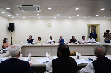 NEW DELHI, INDIA - MARCH 7, 2024: Congress president Mallikarjun Kharge and Sonia Gandhi during the Congress Central Election Committee (CEC) meeting for the upcoming Lok Sabha polls, at AICC Headquarters, on March 7, 2024 in New Delhi, India. clipart