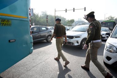 NEW DELHI, INDIA - MARCH 14, 2024: Delhi police and Gautam Buddha Nagar police force deployed at Noida-Delhi Chilla border to stop farmers rally, on March 14, 2024 in New Delhi, India. Punjab farmers have gathered at Ramlila Maidan. clipart