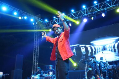 NEW DELHI, INDIA - FEBRUARY 26, 2024: Singer Salman Ali performs during the Sports and Cultural Week 2024 at Jamia Hamdard University clipart