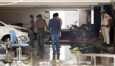 NEW DELHI, INDIA - JULY 29, 2024:  Delhi Police officers and MCD officials investigate Rau's IAS Study circle Spot at Old Rajinder Nagar area, after three civil services aspirants died at a coaching centre due to drowning clipart