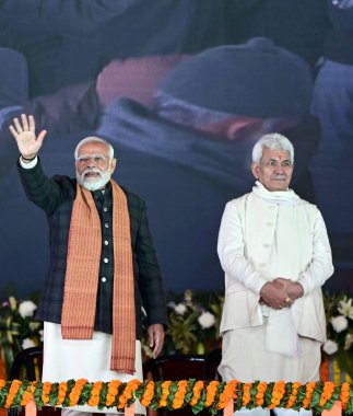 SRINAGAR, INDIA - MARCH 7, 2024: Prime Minister Narendra Modi along with Jammu and Kashmir Lieutenant Governor Manoj Sinha waving at a public during the launch of various projects and a public rally at Bakshi Stadium clipart