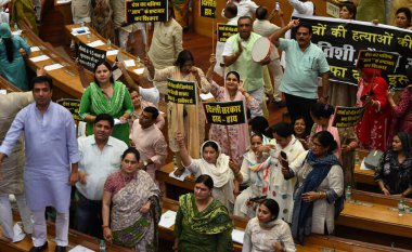 NEW DELHI, INDIA - JULY 29, 2024:  BJP councillor protest Against Delhi mayor shelly oberoi and AAP government's during the House meeting of Municipal Corporation of Delhi at civic center  on July 29, 2024 in New Delhi, India.   clipart