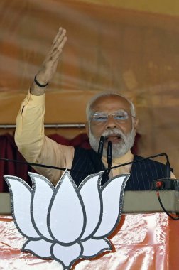 NORTH 24 PARGANAS, INDIA - MARCH 6, 2024: Prime Minister Narendra Modi addresses during Narishakti Vandana Rally organised by Bharatiya Janata Party and Bharatiya Janata Mohila Morcha at Barasat on March 6, 2024 in North 24 Parganas, India   clipart