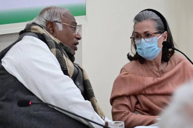 NEW DELHI, INDIA - MARCH 7, 2024: Congress president Mallikarjun Kharge and Sonia Gandhi during the Congress Central Election Committee (CEC) meeting for the upcoming Lok Sabha polls, at AICC Headquarters, on March 7, 2024 in New Delhi, India. clipart