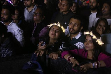 NEW DELHI, INDIA - MARCH 2, 2024: Crowds enjoy the performance of Singer-music composer Vishal Mishra during his Pehle Bhi Main India Tour, curated by Fever Live  the live entertainment vertical of Fever Network clipart