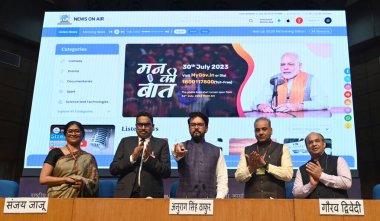 NEW DELHI, INDIA - MARCH 13, 2024: Union Minister for Information & Broadcasting and Youth Affairs & Sports Anurag Singh Thakur and Secretary, Ministry of Information and Broadcasting, Sanjay Jaju and others launching revamped websites of DD News. clipart