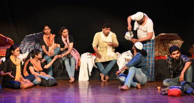 NEW DELHI, INDIA - MARCH 27: Artists performing a play Topi Shukla authored by Rahi Masoom Raza at National School of Drama, Mandi House on March 27, 2024 in New Delhi, India. Dramatic adaptation of famous novel is done by Akhtar Ali  clipart