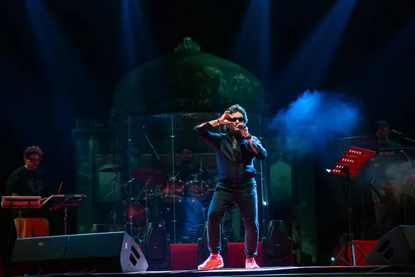 stock image NEW DELHI, INDIA - MARCH 4, 2024: Singer Javed Ali performs during a concert organized by Delhi Tourism at Sunder Nursery