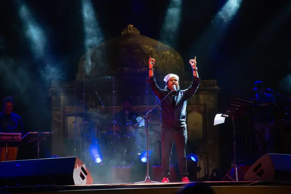 stock image NEW DELHI, INDIA - MARCH 4, 2024: Singer Javed Ali performs during a concert organized by Delhi Tourism at Sunder Nursery