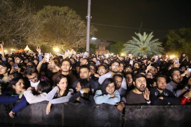 NEW DELHI, INDIA - MARCH 2, 2024: Crowds enjoy the performance of Singer-music composer Vishal Mishra during his Pehle Bhi Main India Tour, curated by Fever Live  the live entertainment vertical of Fever Network clipart