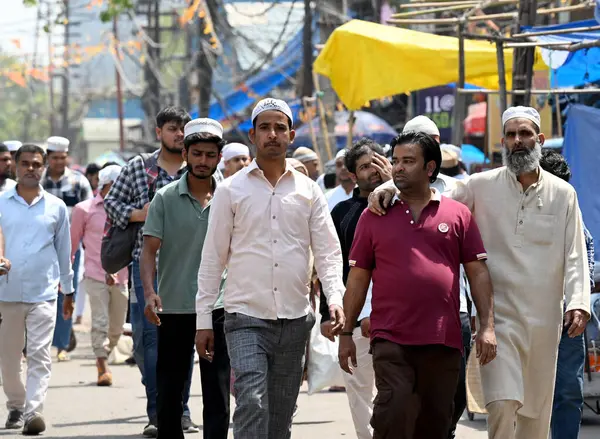 stock image NOIDA, INDIA - MARCH 29, 2024: Noida Police personnel conducted a flag march in Sector 8 as security measures heightened following the demise of gangster-turned-politician Mukhtar Ansari, who passed away due to cardiac arrest at a hospital in Banda.